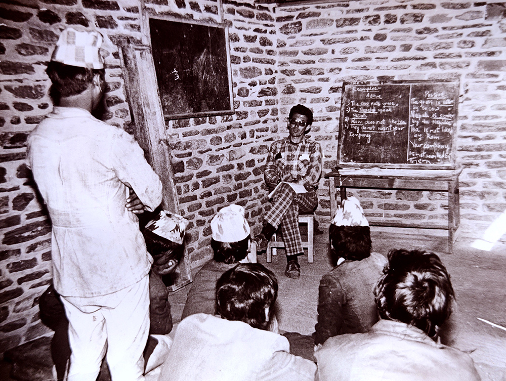 Larry teaching in Jumla in the 1980s, with some snazzy clothes!