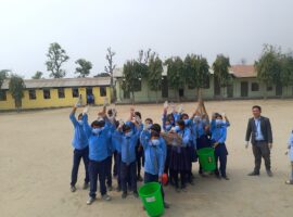 Brooms and saplings in tiny hands!